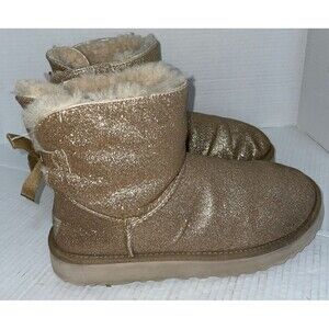 UGG Boots Women's Size 9 Gold Classic Short Bows Sparkle Shearling Mini Bailey